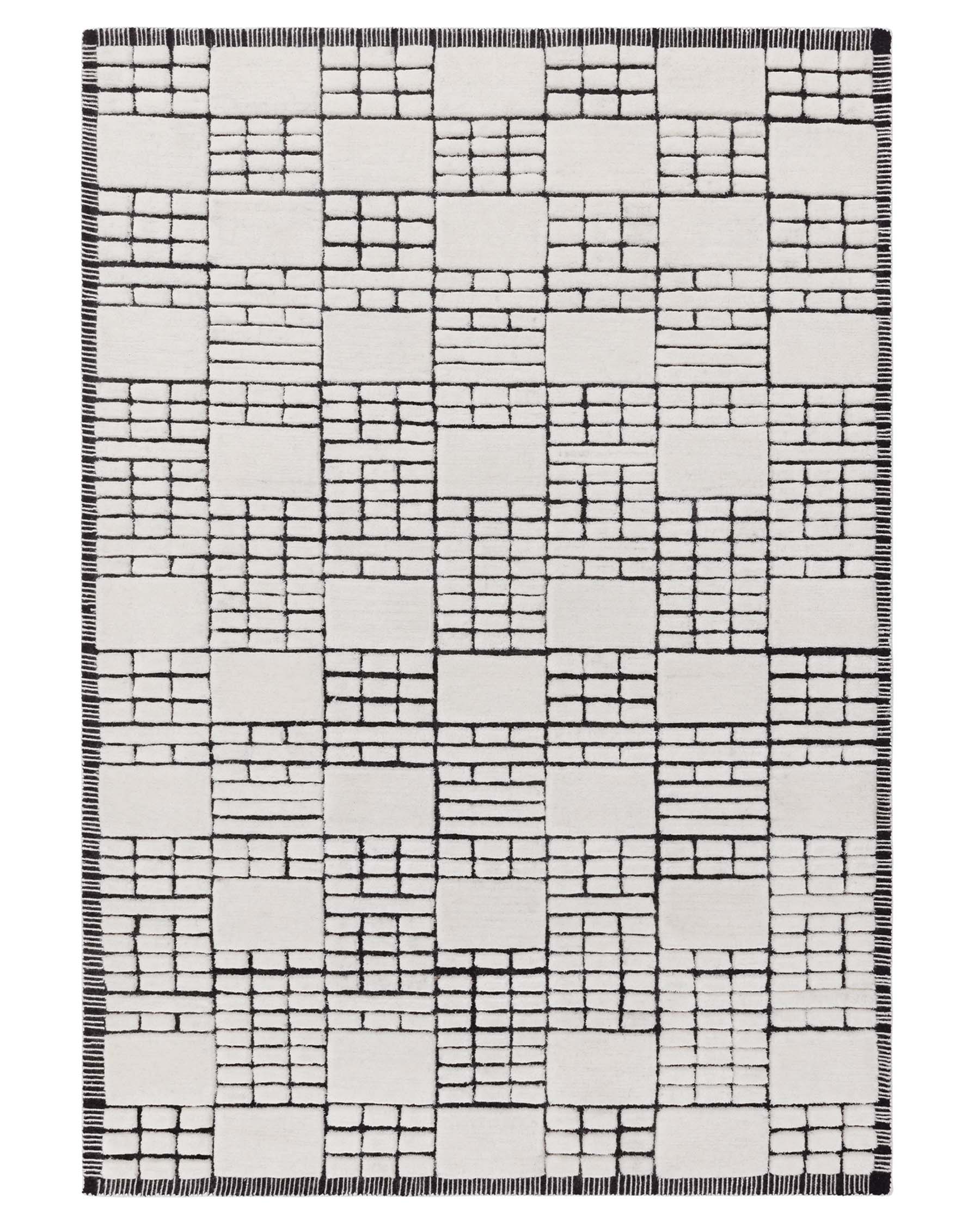 Mosaic cream and black sculpted wool small rug