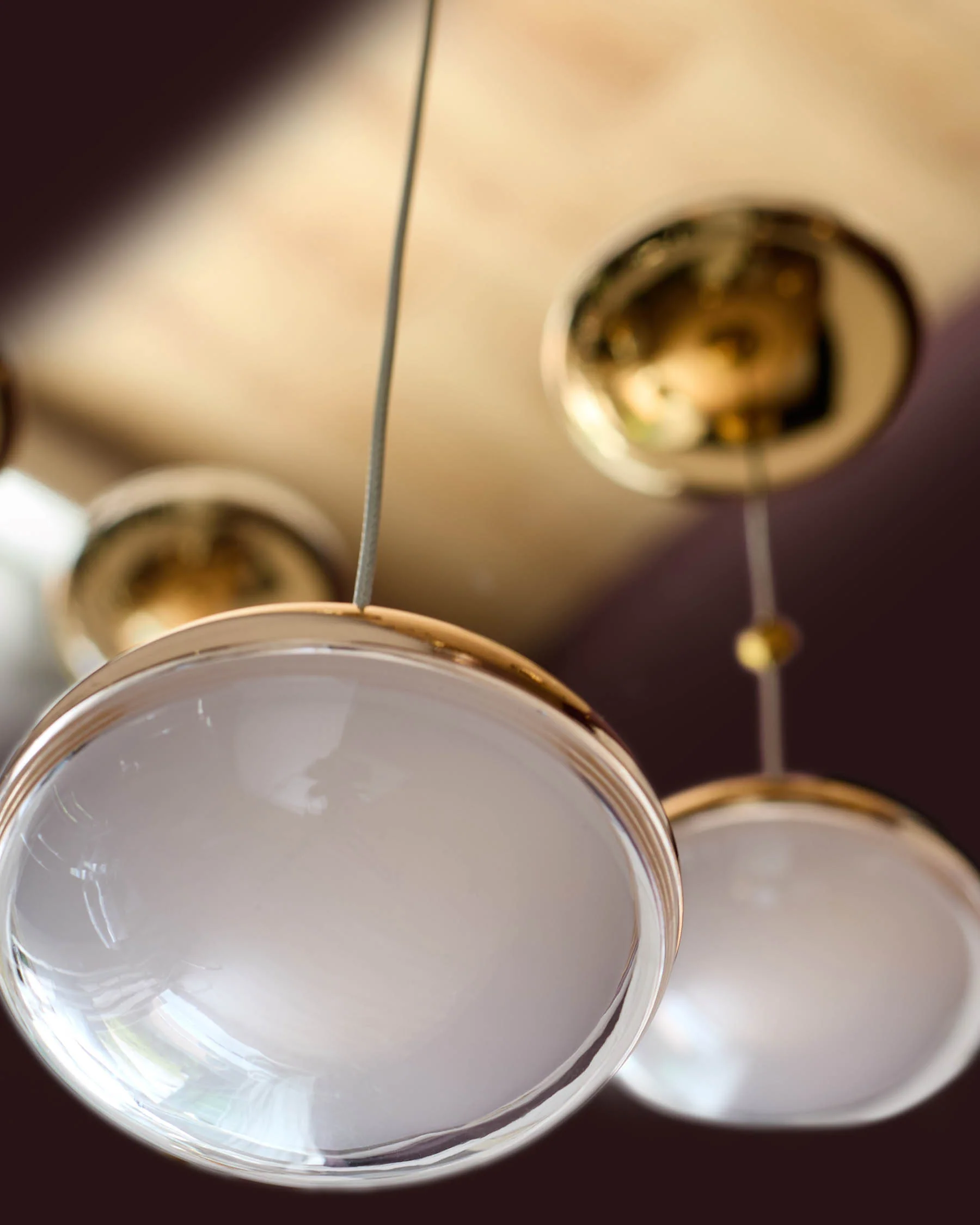 Nina soft gold with clear glass LED adjustable 7 pendant light - Image 12